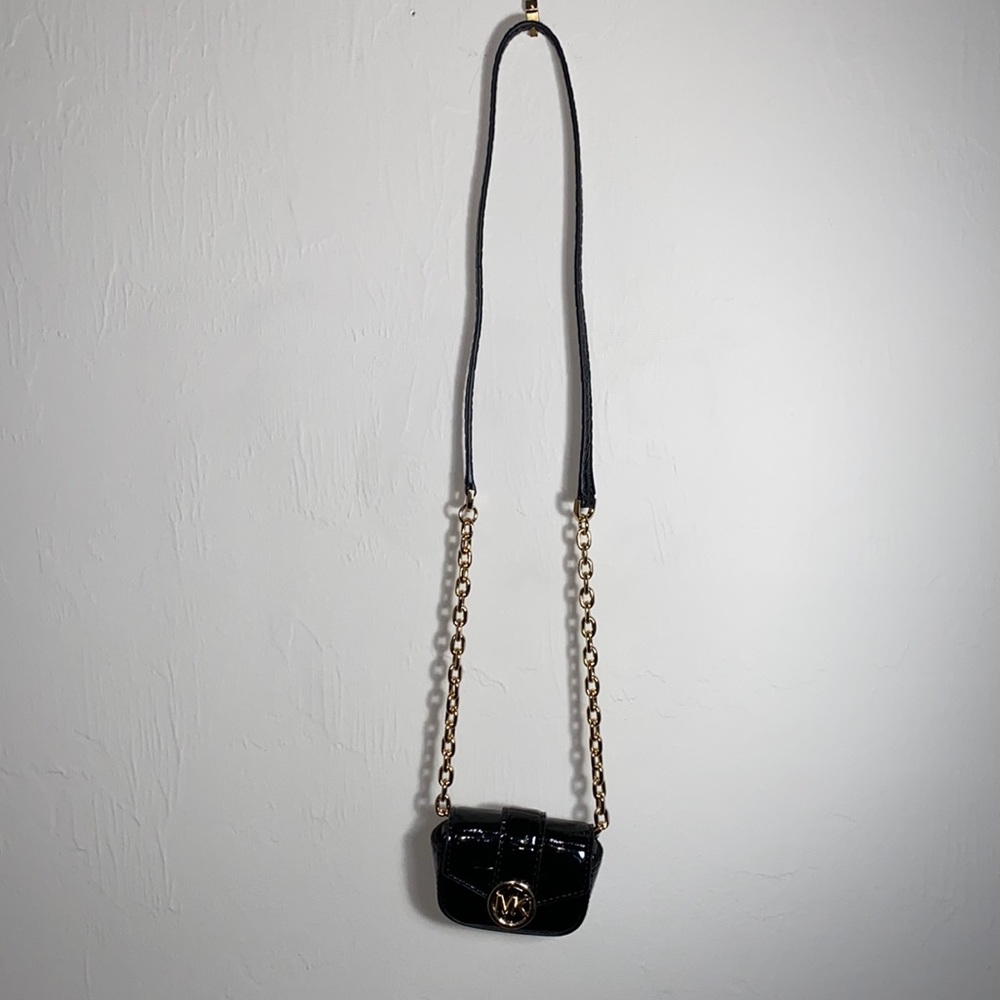 Black patent leather Michael Kors AirPod Pro Case with strap.